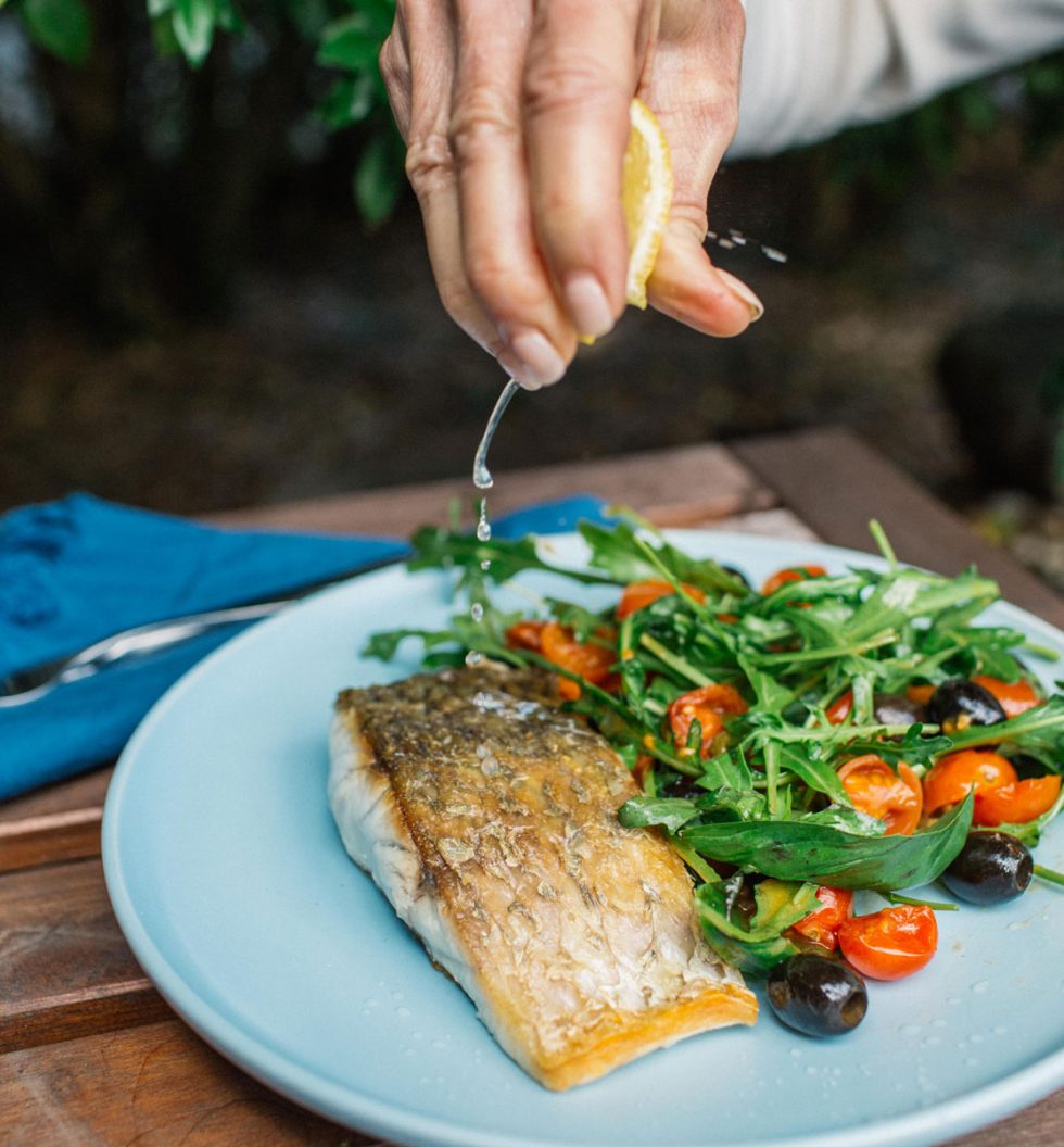 Warm barramundi salad with tomatoes, capers and olives Great
