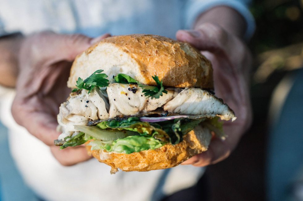 BBQ barramundi burger with grilled cos, grilled lemon and jalapeno tartare Great Australian