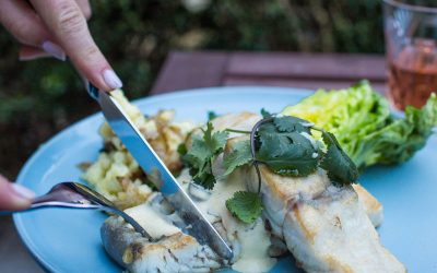 Crisp skinned barramundi with smashed potatoes and baby cos and mint salad with citrus dressing