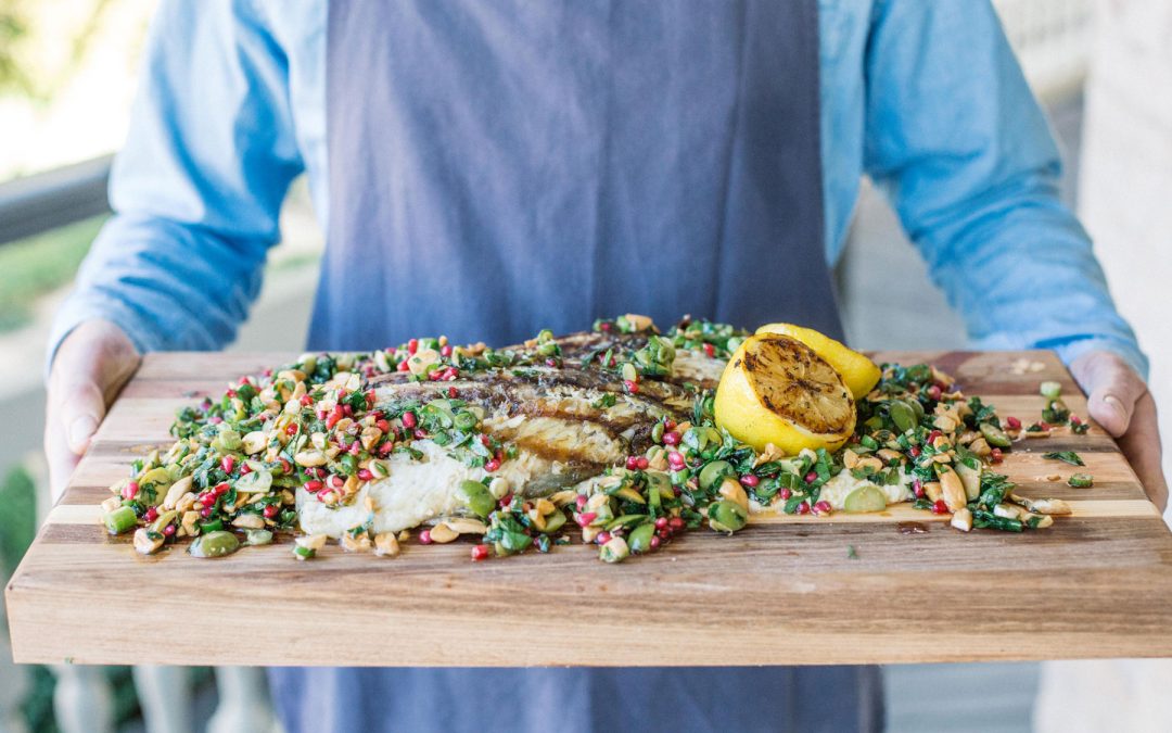 BBQ barramundi with pomegranate and green olive tabbouleh