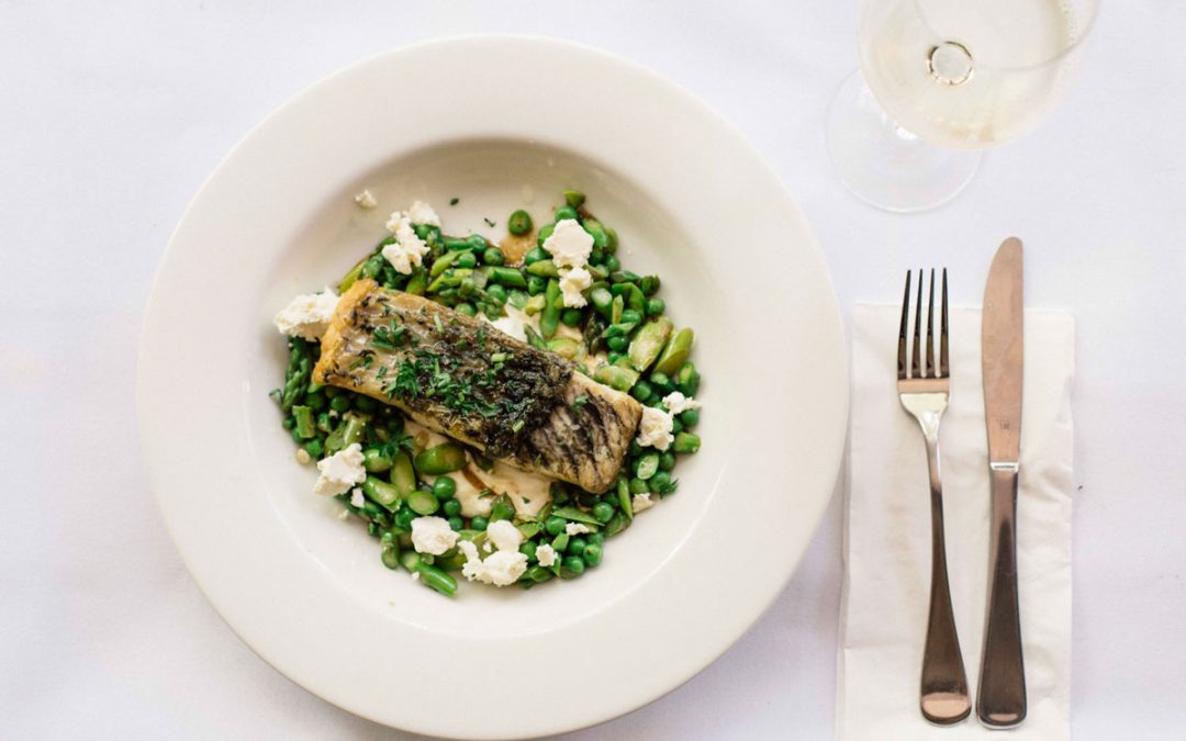 Pan fried barramundi with yoghurt, peas and asparagus