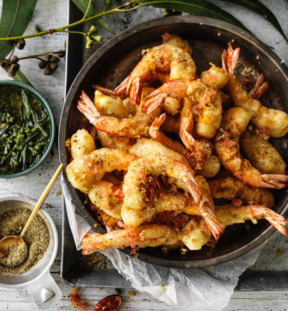 Bush fennel fried prawns with finger limes and samphire salsa